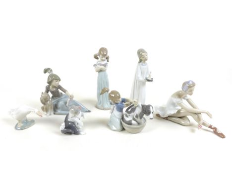 A collection of Lladro and Nao figurines, comprising 'Cat and Mouse', boxed, 'Don't Forget Me', boxed, 'Rose Ballet', boxed, 