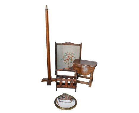 A group of furniture, comprising an embroidered fire screen, 59 by 25.5 by 79cm high, a standard lamp, a small oak drop leaf 