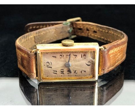 Unicorn 9ct gold wrist watch, having a 15 jewel manual movement in 9ct Gold rectangular case (winds &amp; runs, crack to glas
