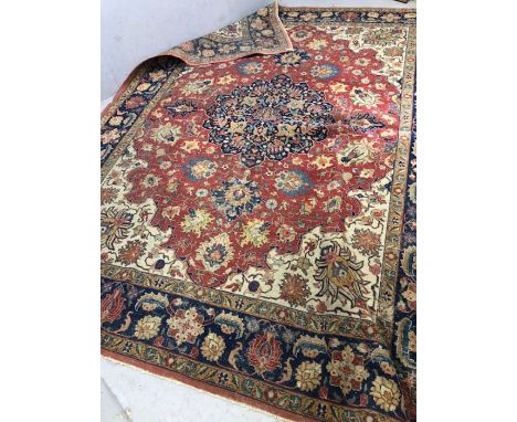 Large red ground vintage rug, approx 348cm x 252cm