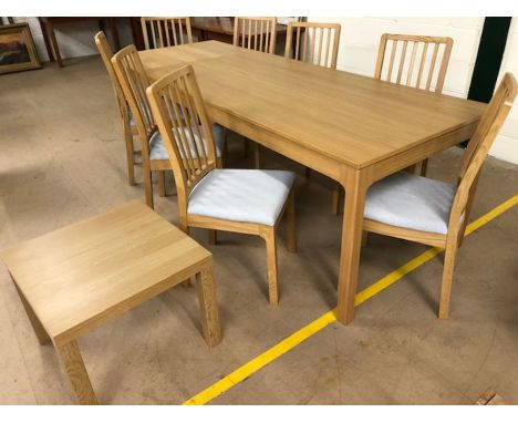 Large extendable light wood IKEA dining table with eight matching upholstered dining chairs.  Extended approx 240cm x 90cm x 