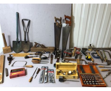 Large collection of vintage and modern tools to include drills, chisels, saws, hammers, plane etc