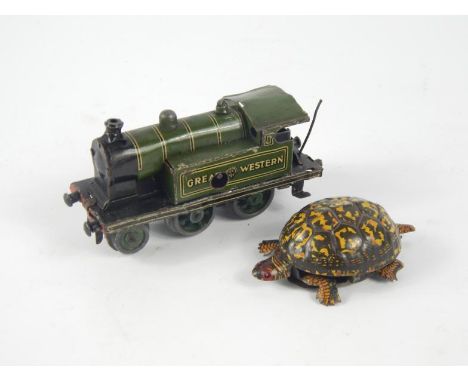 An early 20thC tin plate model clockwork locomotive for The Great Western Railway, 9.5cm, and a small tin plate model tortois