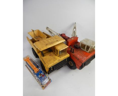 A Tonka 24Hr Service Wrecker Truck, Mighty Tonka dumper truck, Tri-ang cement lorry and a Cross Country fire engine, (4).