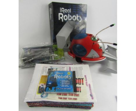 Various games effects toys, etc, to include a remote controlled Real Robot, various other Real Robot effects, etc, (qty).