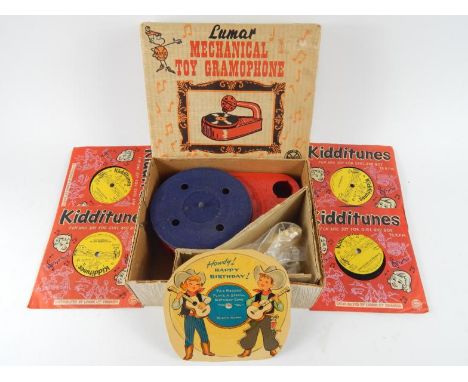 A Lumer Marx mechanical toy gramophone, with records, (boxed), (AF).