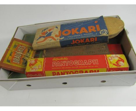 An early 20thC and bygone games, to include Pantograph, cribbage board, draughts set, etc, Gokare Childrens model, bygone tab