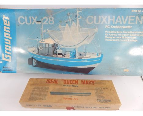 An 18" model of the Queen Mary, with moulded hull (boxed) and a CUX28 Haven model ship (each boxed)
