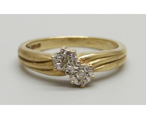 A 9ct gold and diamond crossover ring, 2.5g, K 