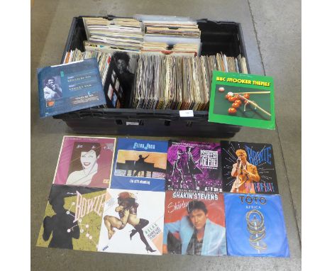 A collection of 1960s and 1970s pop and rock 7" singles including The Beatles and The Rolling Stones 