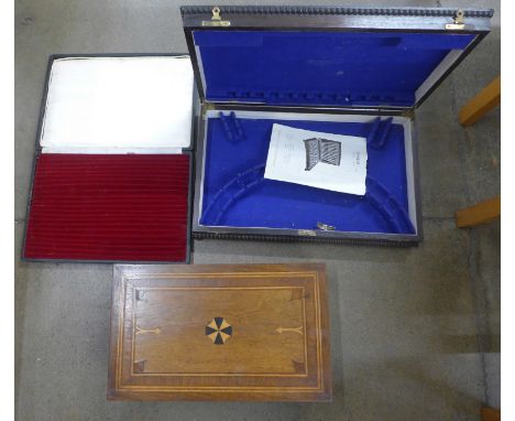 A Victorian inlaid writing slope, a Georgian tea caddy and two cutlery cases