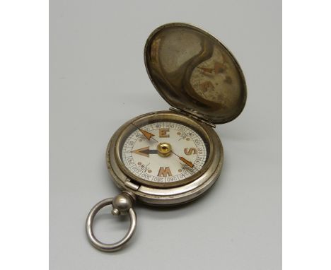 A WWI British compass, the case marked with broad arrow, Terrasse. W. Co., VI, 75063, 1918 