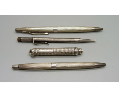 A Victorian silver propelling pencil, a silver pencil by Sampson Mordan and two silver ballpoint pens 