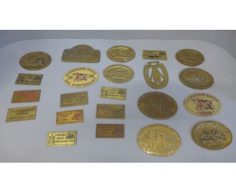 A collection of brass plaques, mostly steam engine related 