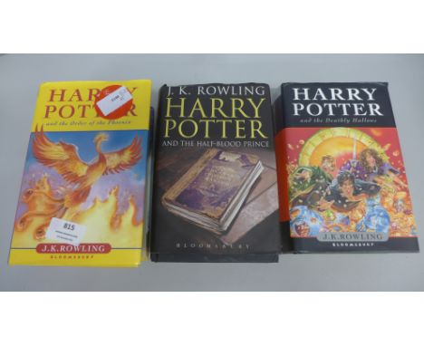 Three Harry Potter first edition hardback books 