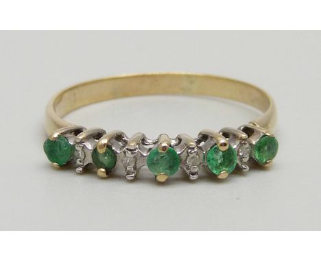 A 9ct gold diamond and emerald ring, 1.6g, S 