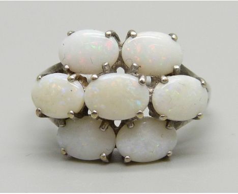 A 9ct white gold and opal cluster ring, 4.5g, V 