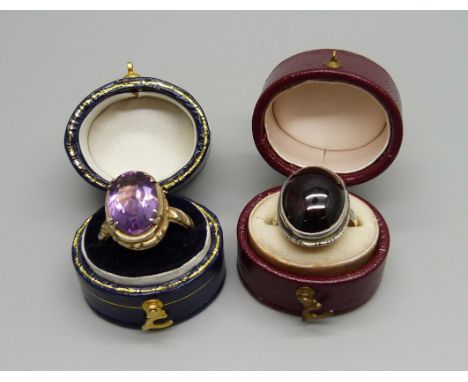 A silver and almandine garnet ring and a gilt metal amethyst ring, K and P 