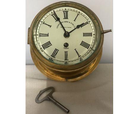 Brass ships clock by H Browne &amp; Sons Ltd. Barking &amp; London winds and goes.