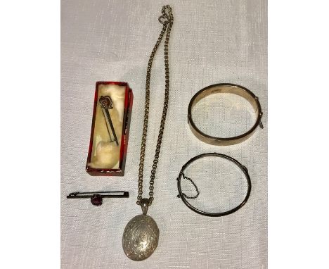 Vintage silver jewellery to include two bangles, a pocket watch on chain and two brooches.