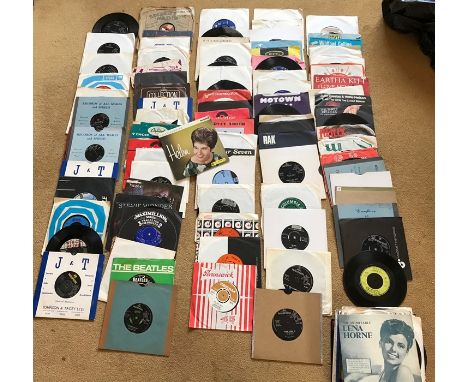 A collection of 45 records including 50's, 60's, artists including the Beatles. 