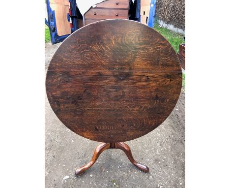 Tip top oak table, 89cms d, on tripod base.