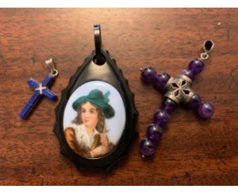 Jet pendant, small lapiz cross and an amethyst cross