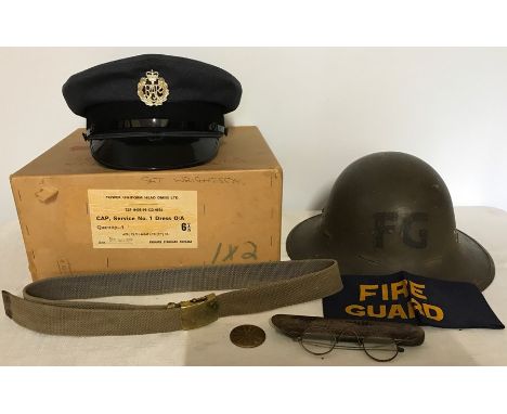 WWII fireguard helmet and armband, RAF service cap, 1975, belt, spectacles and scout oath medallion.