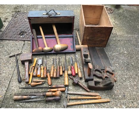 Carpentry tools, chisel, mallets, saws, scribe etc in an Anchor butter box.  