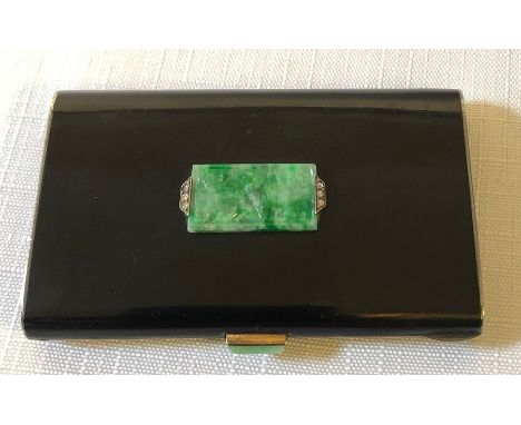 Exceptional quality enamel compact embellished with jade and diamonds, believed to be 18carat gold.