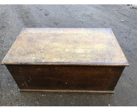 Pine trunk with Mr. H. Sharpe painted to top.