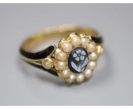 A Victorian 18ct gold, black enamel, seed pear and hardstone set oval mourning ring, inscribed 'Charles Monroe Johnson, died 