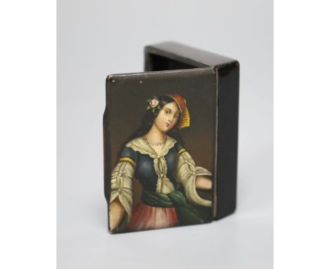A papier mache snuff box with a portrait of a lady to the lid