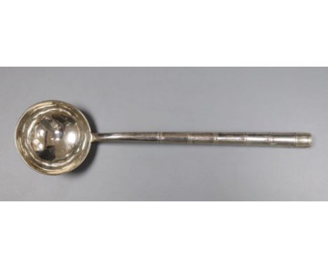 An early 20th century Chinese Export white metal ladle, with faux bamboo handle, Wing Nam &amp; Co, 18.9cm, 40 grams.
