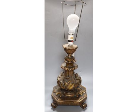 An Italian carved giltwood table lamp, height 40cm excl. light fittingCONDITION: Table lamp. Urn surmount appears to have bee