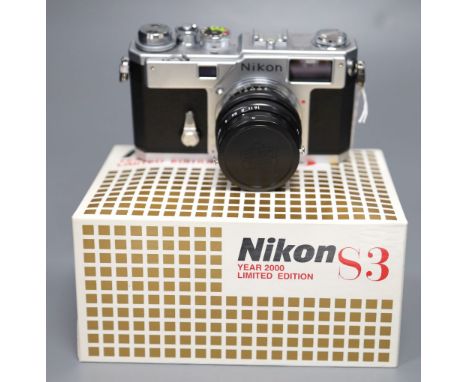 A Nikon S3 year 2000 Limited Edition range finder camera, serial no 204941 with Nikkor F/1.4 50m lens, boxed, unused