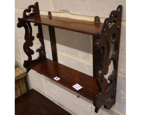 A Victorian mahogany two tier wall bracket, width 52cm depth 17cm height 46cm