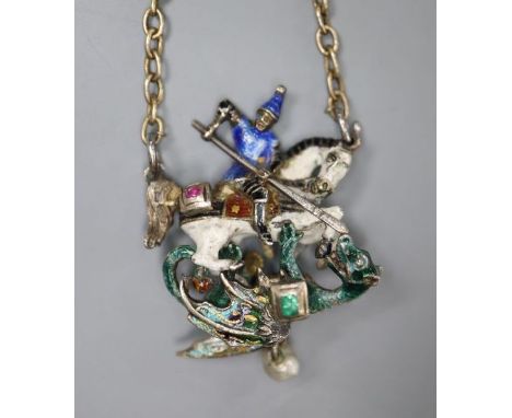 A late 19th/early 20th century Austro-Hungarian white metal, two sided polychrome enamel and gem set 'St George &amp; The Dra