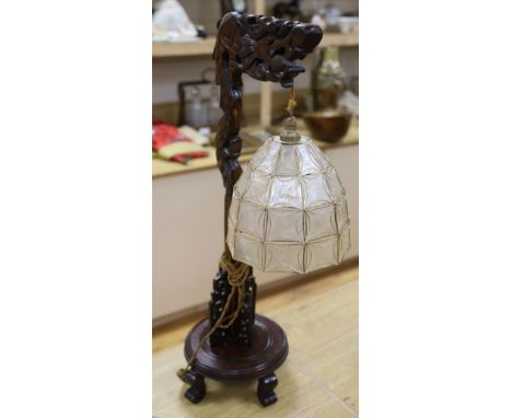 A 19th century Chinese carved hardwood lamp, height 71cm