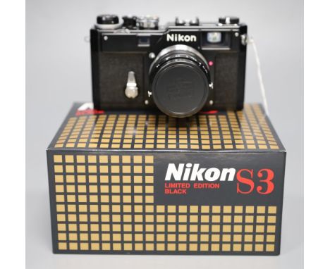 A Nikon S3 Limited Edition block range finder camera, serial no 303307 with Nikkor F/1.4 500mm lens, boxed, unused