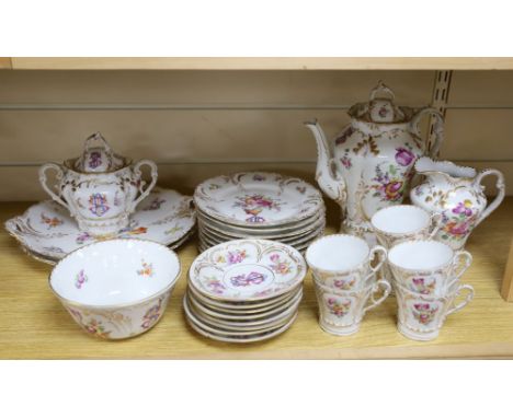 A 19th century Continental 29 piece gilt and floral coffee set, monogrammed, coffee pot 26cmCONDITION: Coffee pot - chipped s