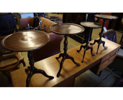 A 1920's chinoiserie lacquer tripod table, height 54cm and three others