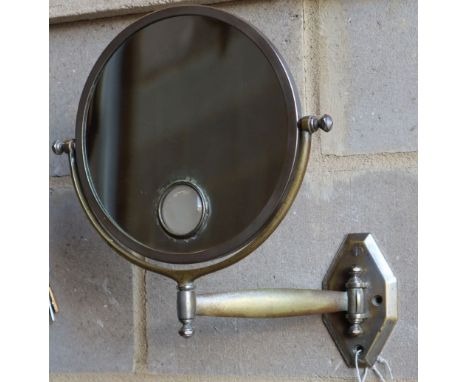 An Art Deco shaving mirror, plate 24cm diameter