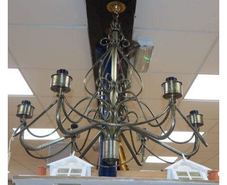 A wrought metal six branch ceiling light, 78cm diameter