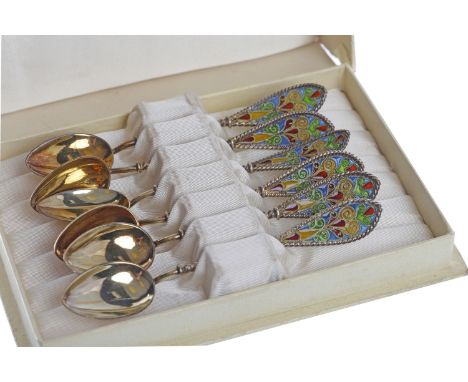 SET OF SIX GILT SILVER AND ENAMEL COFFEE SPOONSmarked 925 below the twisted stem, the stem surmounted by a polychrome enamel 