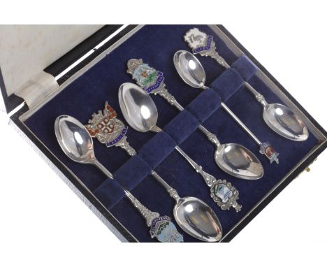 GROUP OF SILVER AND ENAMEL SOUVENIR TEASPOONSeach marked for a different maker, mostly 20th century, each with enamel termina