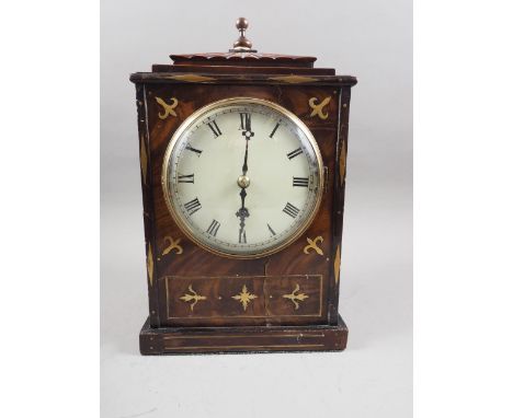 An early 19th century mahogany and brass inlaid bracket clock with single fusee movement, enamelled dial, Roman numerals and 