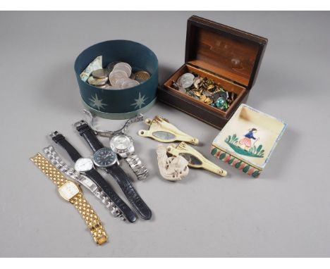 A quantity of commemorative crowns and other coins, gentleman's wristwatches, badges, cufflinks and other items 
