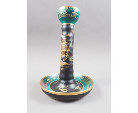 A Carlton ware "Black Japan" style candlestick, 8 3/4" high 