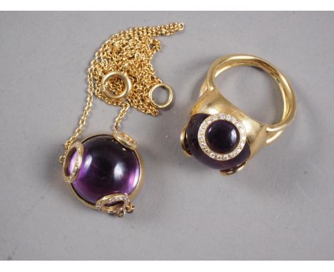 A yellow metal, diamond and amethyst coloured dress ring, size M, and a matching pendant, on chain 